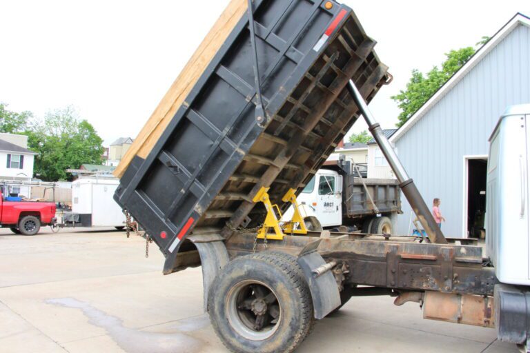 Dump truck safety stands by BedLock Safety Products, LLC.